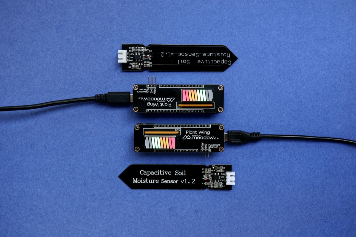 Multiple electronic sensor modules laid out on a surface, representing multi-sensor hardware integration